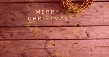 Beyaz arka plandaki keklerin üzerinde noel tebriklerinin animasyonu. Noel mevsimsel selamlamaları ve dijital olarak oluşturulan kutlama konsepti.