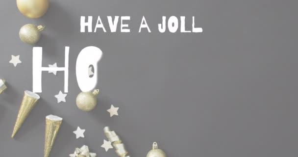 黒を背景にクリスマスの装飾の上に陽気な休日のテキストと大晦日のパーティーのコンセプト — ストック動画
