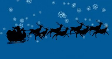 Noel Baba 'nın siluetinin üzerine düşen kar tanelerinin rengeyikleri tarafından çekilen kızakla canlandırılması. Noel şenliği ve kutlama konsepti