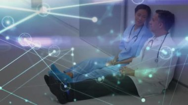 Çeşitli doktorlar üzerindeki bağlantı ağının animasyonu. Dijital olarak oluşturulmuş küresel bağlantılar, tıp ve dijital arayüz kavramı.