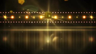 Arka plandaki spot ışıklarının üzerine düşen noel altınlarının animasyonu. Noel, şenlik, kutlama ve gelenek konsepti dijital olarak oluşturuldu.