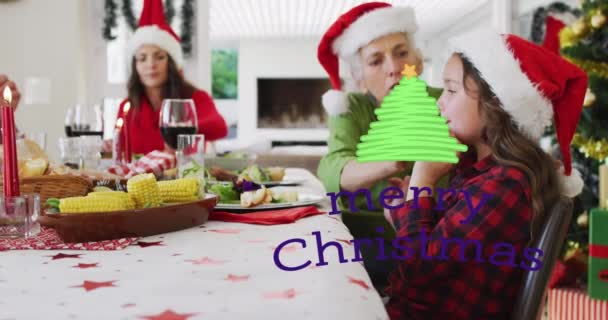 Animatie Van Vrolijke Kersttekst Kaukasische Familie Met Kerstmutsen Kerst Traditie — Stockvideo