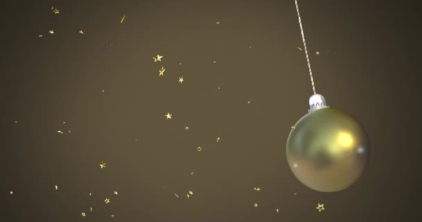 Κινούμενα Σχέδια Των Χριστουγέννων Χρυσό Μπιχλιμπίδι Πάνω Από Αστέρια Που — Αρχείο Βίντεο