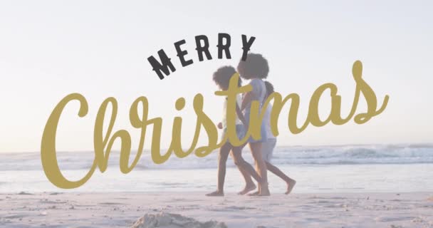 크리스마스 메시지를 애니메이션 해변에 얼굴을 여성에게 보내는 메시지를 크리스마스 디지털 — 비디오