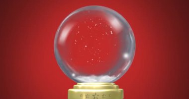Kırmızı zemine kar yağan Noel kar küresinin animasyonu. Noel, şenlik, gelenek ve kutlama konsepti dijital olarak oluşturuldu.