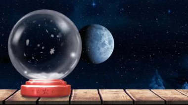 Noel Baba 'nın kızağındaki kar küresi, kar yağışı ve dolunay animasyonu. Noel, şenlik, gelenek ve kutlama konsepti dijital olarak oluşturuldu.