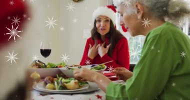 Beyaz aile üzerinde Noel Baba şapkası takan kar tanelerinin canlandırılması. Noel, gelenek ve kutlama konsepti dijital olarak oluşturuldu.