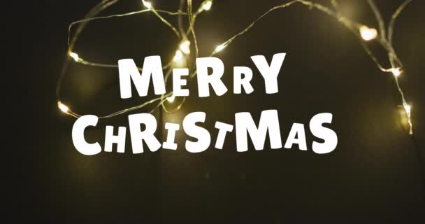Animacja Świątecznych Pozdrowień Tekst Nad Świątecznymi Światełkami Bajki Boże Narodzenie — Wideo stockowe