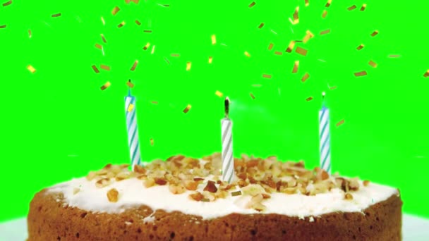 このビデオでは 金のコンフェッティが緑色の画面に落ち 誕生日のろうそくが緑色の画面に吹き飛ばされています — ストック動画