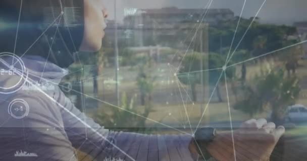 Animation Dots Connected Lines Database Biracial Woman Using Smartwatch Balcony — Stock Video