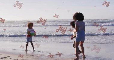 Noel tebriklerinin animasyonu, Afrika kökenli Amerikalı annesi ve çocukları plajda mesajlaşıyor. Noel, şenlik, kutlama ve gelenek konsepti dijital olarak oluşturuldu.