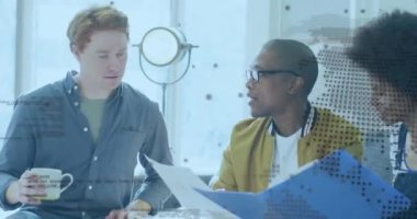 Animation of globe over diverse business people in office. Global business and digital interface concept digitally generated video.