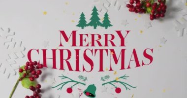 Dekorasyon üzerine Mutlu Noeller metni animasyonu. Noel, kutlama ve dijital arayüz kavramı dijital olarak oluşturulmuş video.