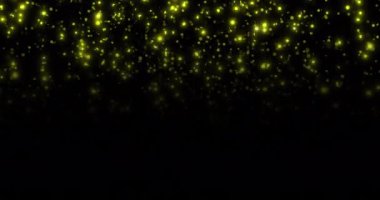 Siyah arkaplanda sarı ışığın parıldayan noktalarının canlandırması. Işık, soyut ve hareket kavramı dijital olarak oluşturulmuş video.