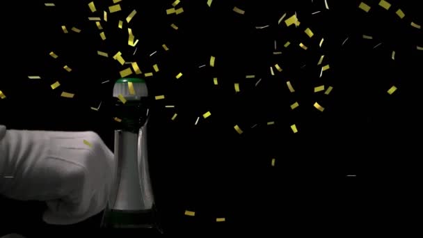 Анимация Падения Конфетти Над Обрезанной Рукой Открывающей Бутылку Шампанского Пробки — стоковое видео