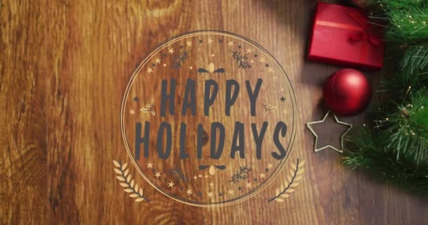 クリスマスの装飾の上に幸せな休日のテキストのアニメーション クリスマス お祝いとデジタルインターフェイスの概念デジタル生成ビデオ — ストック動画
