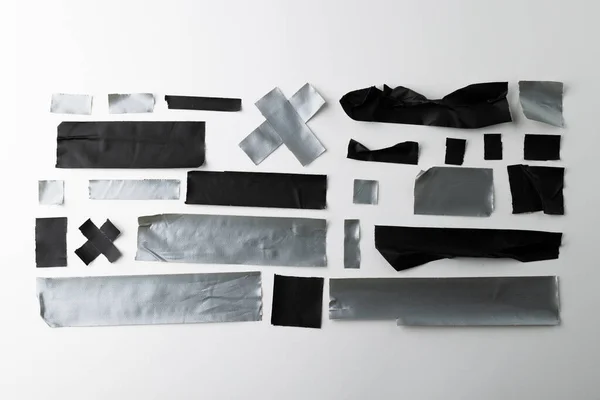 Beyaz Arka Planda Siyah Gümüş Şeritler Yırtılmış Soyut Kağıt Dokusu — Stok fotoğraf
