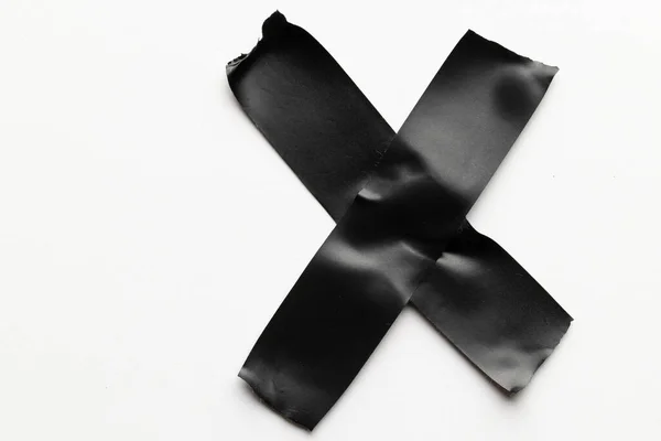 Křížový Tvar Černá Maskovací Páska Bílém Pozadí Abstraktní Papírová Textura — Stock fotografie