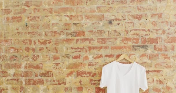 Video Close White Shirt Hanging Brick Wall Background Clothing Fashion — Stock Video