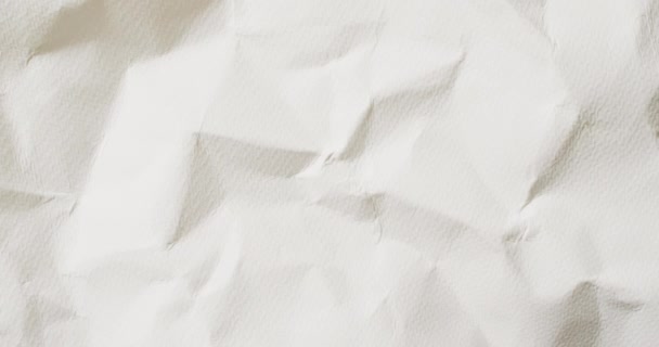 砕いた白い紙の質感の背景のクローズアップのビデオ 素材のコンセプト — ストック動画
