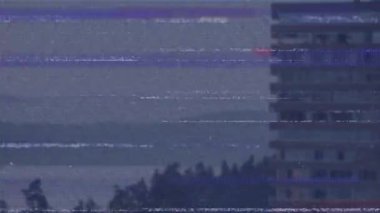 Animation of interference moving over cityscape. Global business and digital interface concept digitally generated video.