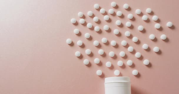 Video Von Weißen Pillenschachteln Und Weißen Pillen Auf Rosa Hintergrund — Stockvideo