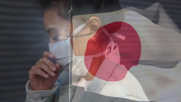 日本国旗在戴着面具的亚洲女人身上的动画 全球爱国主义 大流行病和数字视频接口概念 — 图库视频影像