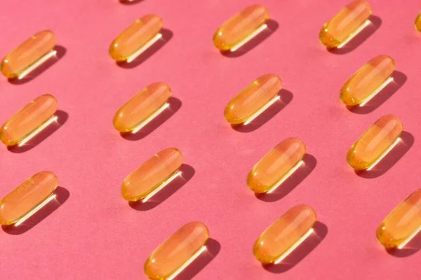 Composition Oil Capsules Arranged Rows Pink Background Medicine Medical Services — Stock Photo, Image