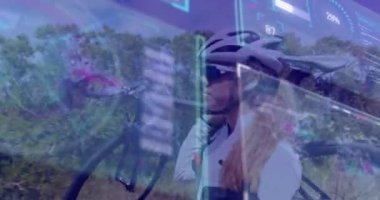 Animation of data processing over caucasian woman cycling. Global sport and digital interface concept digitally generated video.