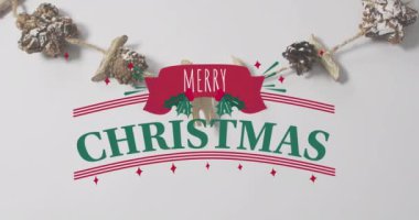 Noel tebriklerinin animasyonu Noel süslemeleri üzerine mesajlaşır. Noel, şenlik, kutlama ve gelenek konsepti dijital olarak oluşturuldu.