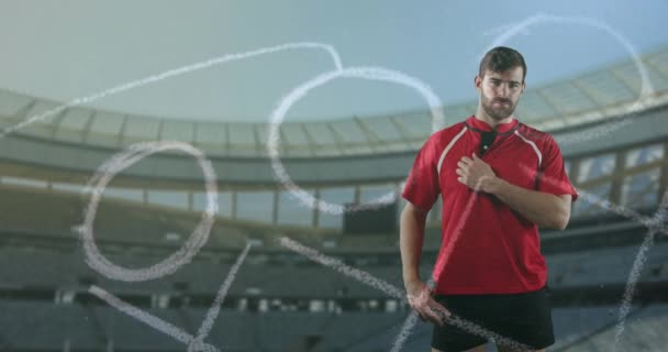 スポーツ競技場の前に立つプロラグビー選手4K — ストック動画