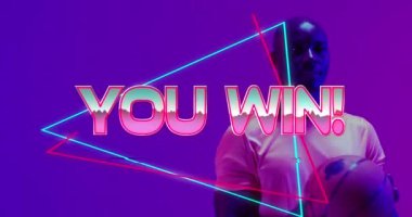 Neon desenli metni ve Afro-Amerikan basketbolcuyu yendiğin animasyon. Spor, rekabet, video oyunu ve dijital olarak üretilen iletişim konsepti.