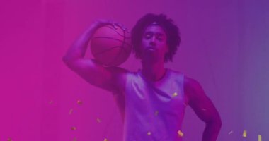 Konfeti ve neon desenli animasyon ve çift ırklı basketbol oyuncusu. Spor, rekabet, video oyunu ve dijital olarak üretilen iletişim konsepti.