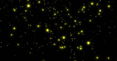 Image of glowing yellow spots falling on black background. Colour, light and movement concept digitally generated image. clipart