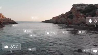 Sosyal medya simgeleri ve köprü animasyonları, deniz manzaralı kayalık kıyılar. Küresel sosyal medya, iletişim ve bağlantılar konsepti dijital olarak oluşturulmuş video.