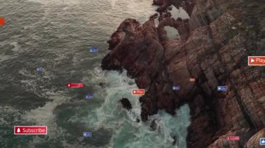 Sosyal medya simgelerinin ve deniz manzaralı kayalık kıyıların animasyonu. Küresel sosyal medya, iletişim ve bağlantılar konsepti dijital olarak oluşturulmuş video.