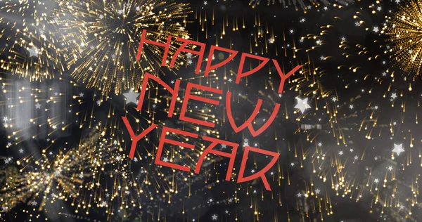 Image of happy new year text in red over gold fireworks on black background. new year, celebration, party, tradition and seasonal event concept digitally generated image.