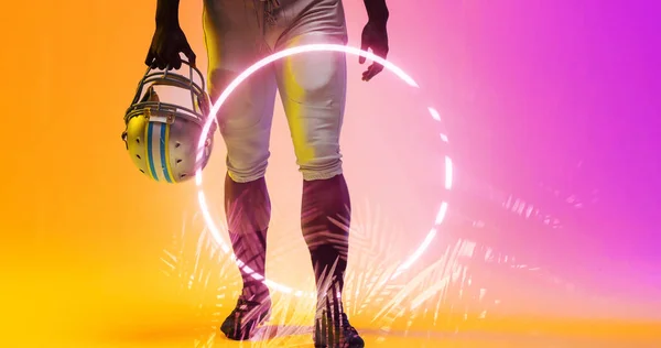 Low Section American Football Player Holding Helmet Walking Illuminated Circle — Stock Photo, Image