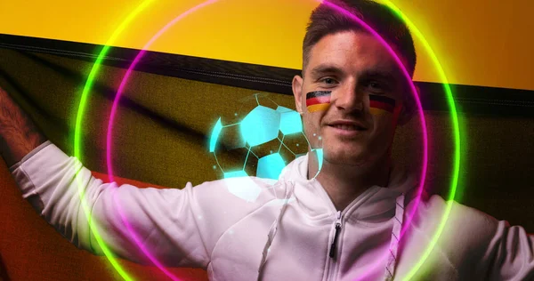 Composite Caucasian Soccer Player German Flag Celebrating Success Abstract Neon — Stock Photo, Image