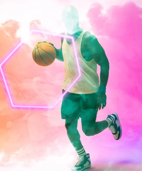 Afro Amerikaanse Mannelijke Speler Dribbelen Basketbal Door Verlichte Zeshoek Roze — Stockfoto