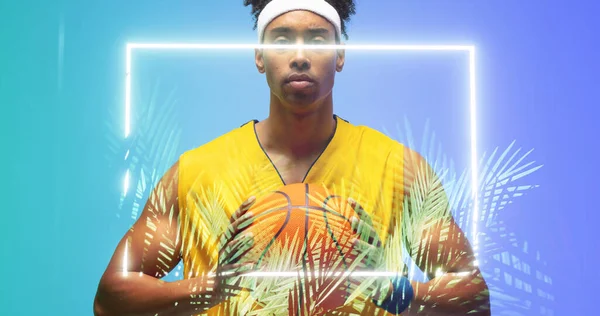Portrait Biracial Basketball Player Holding Ball Front Illuminated Rectangle Plants — Stock Photo, Image