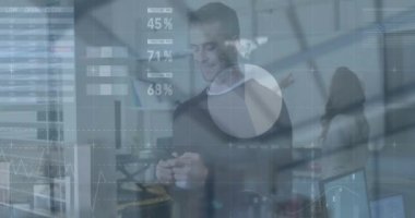 Animation of financial data processing over statistical data processing over banner. Global business connections and data processing concept digitally generated video. Business people behind statistical data processing banner