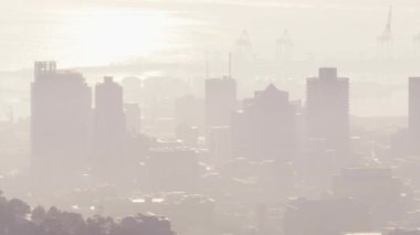 A video of red dots on a cityscape background. Global business data processing and digital interface concept digitally generated video.