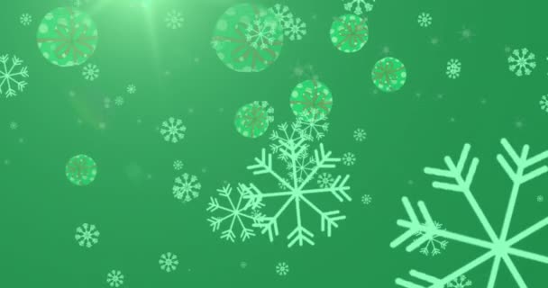 Анимация Снежинок Декоративных Безделушек Падающих Светлое Пятно Зеленом Фоне Концепция — стоковое видео