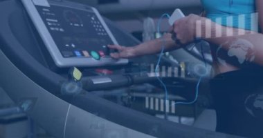Animation of data processing over woman running on treadmill, exercising in gym. Global sports, fitness, computing and data processing concept digitally generated video.