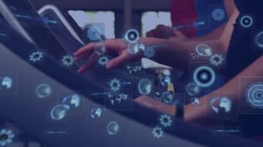 Animation of data processing over people exercising in gym. Global sports, fitness, computing and data processing concept digitally generated video.