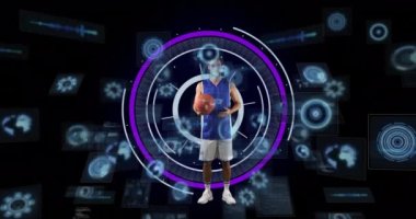 Animation of data processing over male basketball player. Global sports, fitness, computing and data processing concept digitally generated video.