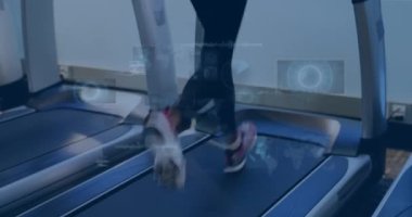 Animation of data processing over woman running on treadmill, exercising in gym. Global sports, fitness, computing and data processing concept digitally generated video.