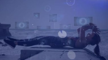 Animation of data processing over woman exercising outdoors. Global sports, fitness, computing and data processing concept digitally generated video.