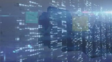 Animation of financial data processing over digital icons. Global business, finance, computing and data processing concept digitally generated video.